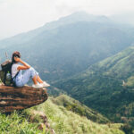 Tourist woman enjoy with beautiful view on mountains in Ella, Sri Lanka, Little Adam Peak